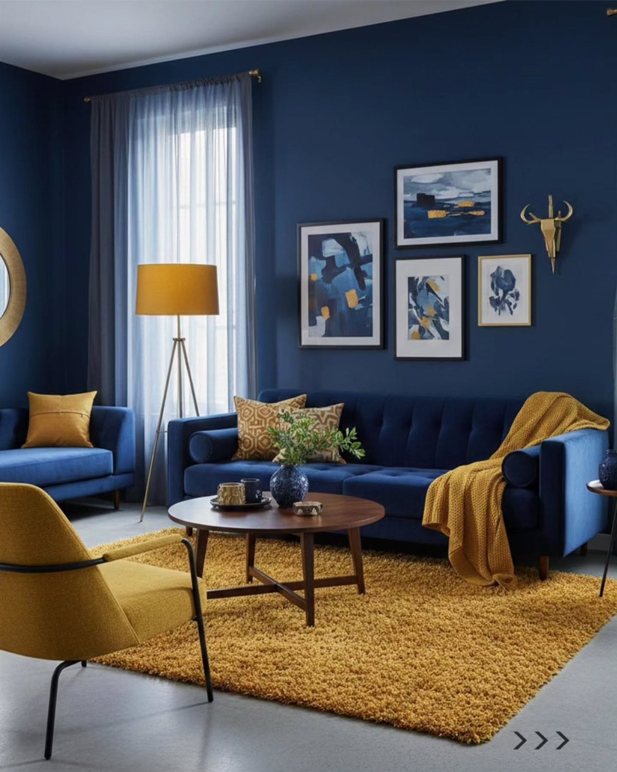 Deep blue living room walls with yellow furniture and a plush yellow rug.